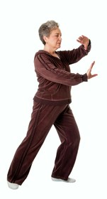 Senior woman doing Tai Chi Yoga exercise